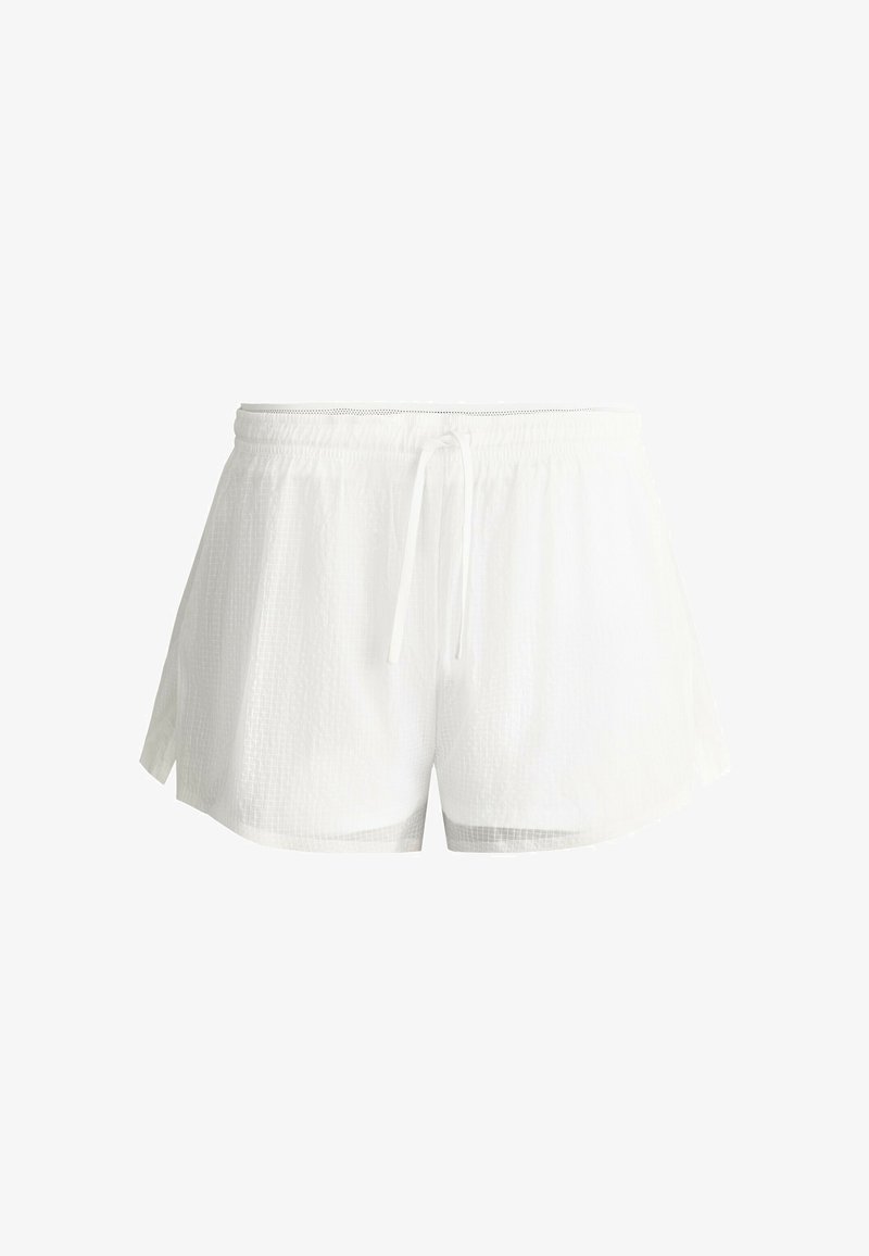 Short blanc léger avec une taille élastique et un cordon, avec des fentes latérales et un motif texturé subtil.