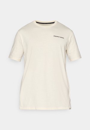 Tricou din bumbac de culoare crem, cu mâneci scurte. Are un mic logo negru imprimat pe partea stângă a pieptului și un guler rotund.