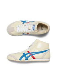 Höga sneakers i krämfärgad läder med blå och röda randiga detaljer. Har vadderad krage och texturerad beige gummisula.