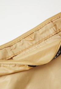 Marimekko NEAT CROSSBODY SOLID - Bevásárlótáska - beige