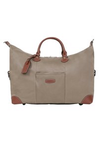 Grand sac de voyage beige avec des accents en cuir brun, poignées doubles et un compartiment zippé. Dispose d'un fond plat pour la stabilité.