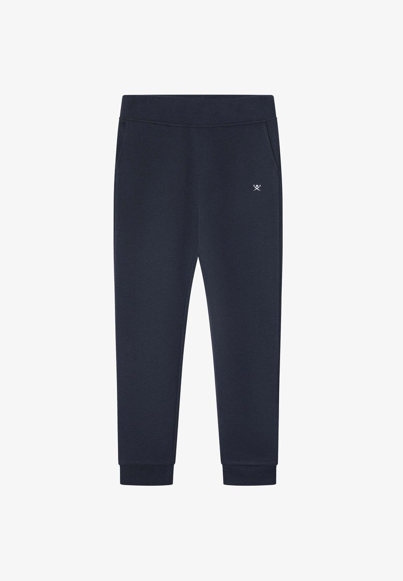 Donkerblauwe sweatpants van zachte stof met een elastische tailleband, tapered boorden en zijzakken. Heeft een klein logo aan de voorkant.