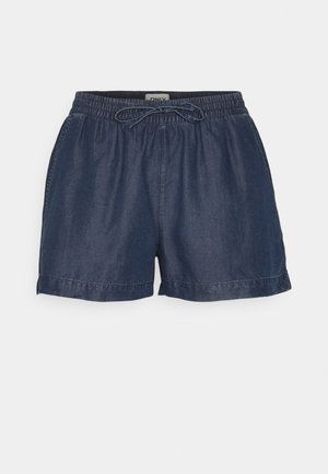 Shorts en denim bleu foncé avec taille élastique et cordon de serrage, coupe ample, longueur mi-cuisse, sur un fond uni.