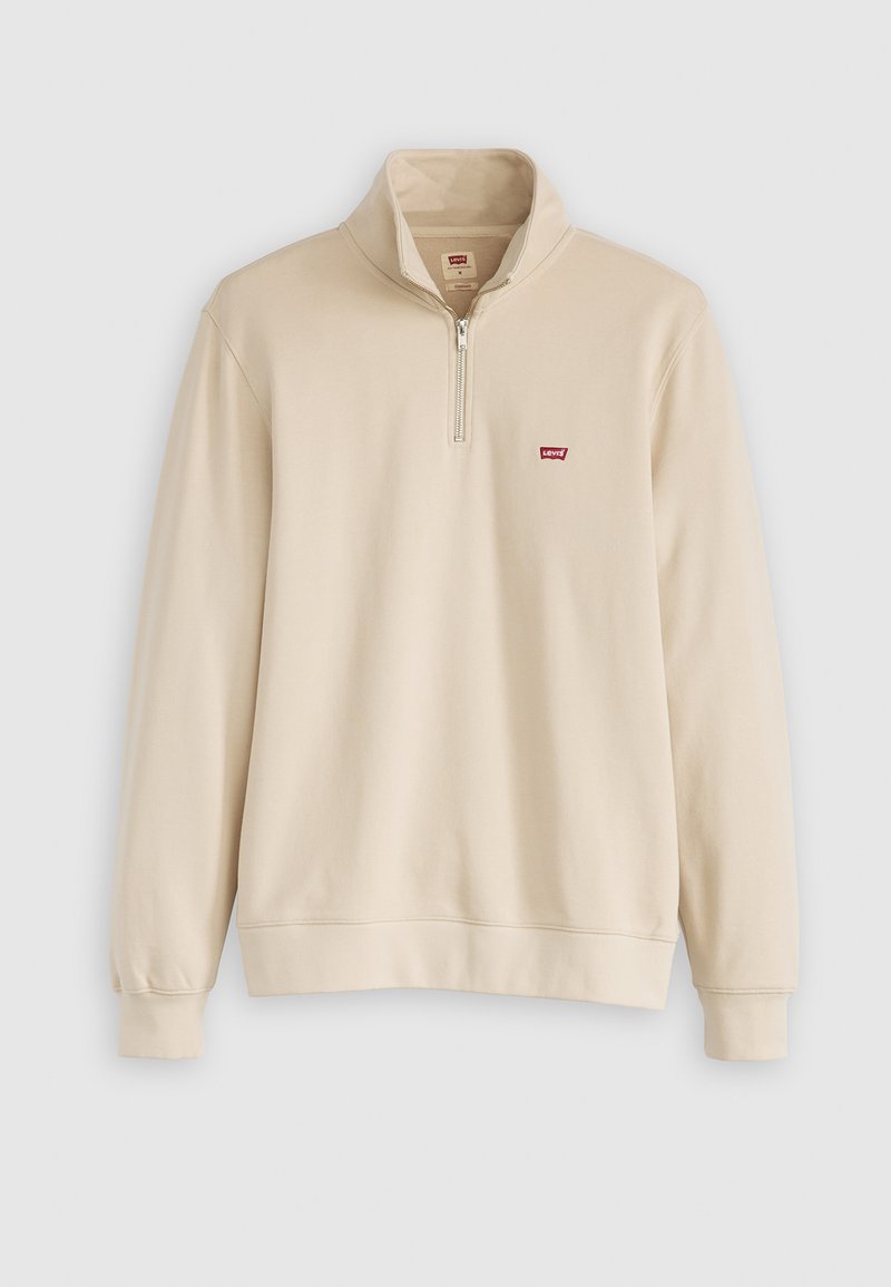 Beige Sweatshirt mit Reißverschluss und hohem Kragen, weicher Textur und kleinem roten Levi's-Logo auf der linken Brustseite. Elastische Bündchen und Saum.