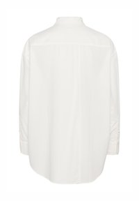 Cămașă albă cu mâneci lungi, în croi lejer, cu spate cu yoke, cu mansete cu nasturi și tiv drept. Material din bumbac neted, fără modele.