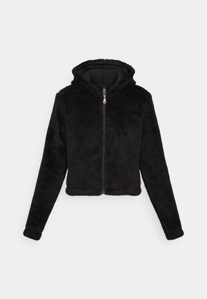 Zwarte cropped hoodie van pluizige stof, met een ritssluiting, capuchon en lange mouwen. Glad binnenvoering met een subtiele glans.