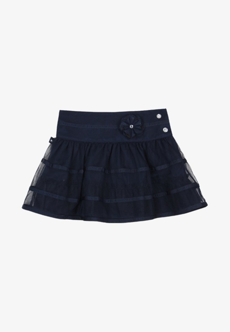Jupe longueur variable bleu marine avec des rayures horizontales en tissu transparent, une décoration en forme de fleur et deux boutons décoratifs à la taille.