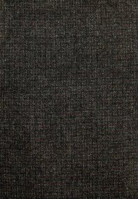 Close-up of dark grey textured fabric with a subtle woven pattern and specks of lighter grey and brown fibers.