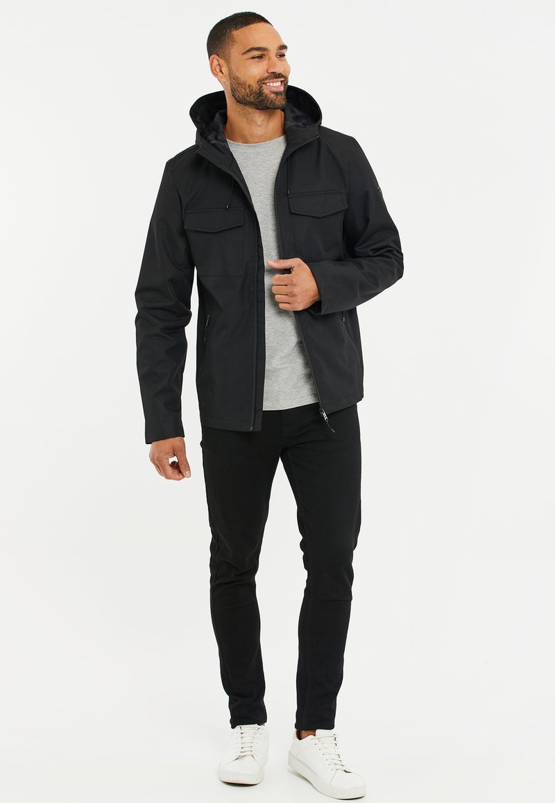 HACKER Chaqueta de entretiempo black/negro - Zalando.es