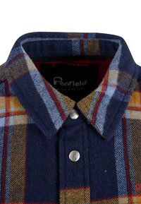 Marine rutete skjorte med gule, røde og blå mønstre. Laget av ull med krave som kan knappes ned og distinkte metallmerke detaljer.