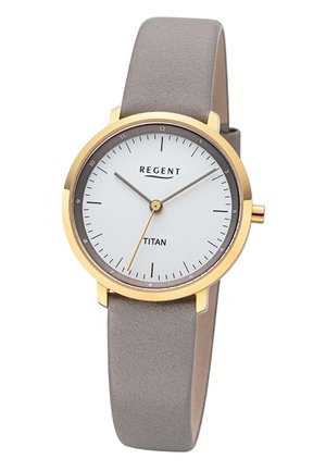 Gold round analog watch with white face, gray hour and minute hands, yellow second hand, gray leather strap, and "REGENT TITAN" text on dial.