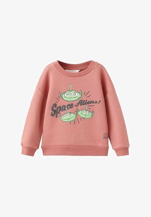 Růžová mikina s kulatým výstřihem a dlouhými rukávy. Na přední straně je grafika tří zelených mimozemšťanů s šedým nápisem "Space Aliens!".