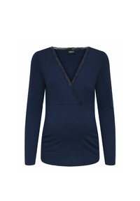 Camiseta de manga larga azul marino con textura acanalada, escote en V y borde de encaje en el escote. Detalle fruncido en la cintura para un aspecto ajustado.