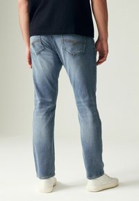 Next ULTIMATE COMFORT SUPER STRETCH - Tiesaus kirpimo džinsai - pale blue