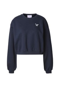 Marinebl�å cropped sweatshirt laget av myk stoff, med lange ermer og en liten brodert sommerfugl-logo på brystet.