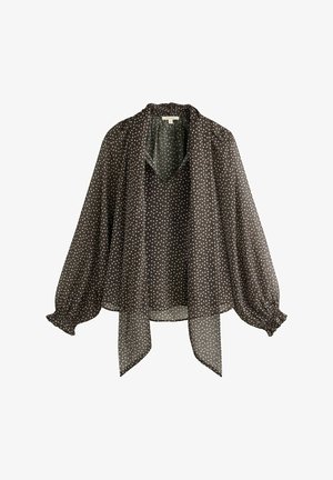 Brun polka dot bluse lavet af letvægtsstof, med v-hals, lange puffærmer med elastiske manchetter og en sløjfe fortil.