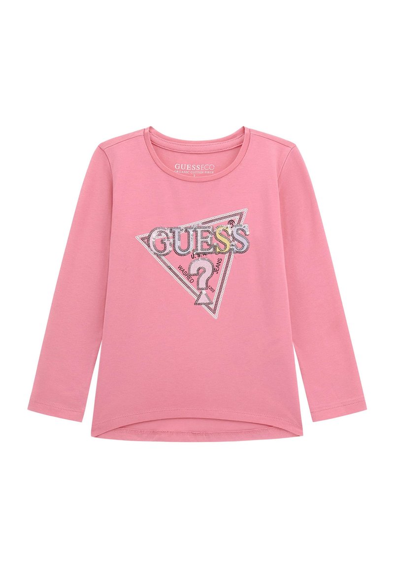 Rosa Langarmshirt aus Bio-Baumwolle mit einem dreieckigen Design aus silbernem Glitzer, versehen mit dem Schriftzug "GUESS" und Fragezeichen-Accents.