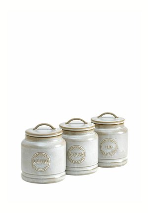 Three beige ceramic canisters with lids labeled coffee, sugar, and tea arranged in a row on a white background.