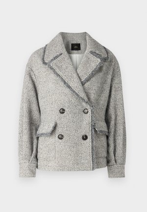 Double-breasted grey houndstooth jacket made from textured fabric. Features large buttons, wide lapels, and a belted waist detail.
