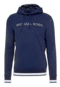 Felpa blu navy con dettaglio logo in argento. Presenta una fodera del cappuccio a fantasia, chiusura con cordino e polsini e orlo a righe.