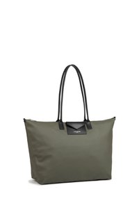 Borsa a tracolla verde oliva con dettagli in pelle nera, forma piatta, doppi manici e chiusura con zip. Presenta una patch con logo sul davanti.