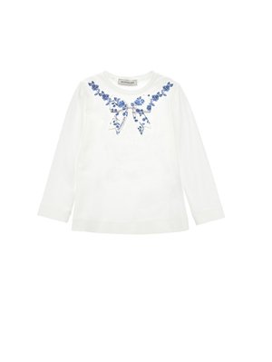 Long-sleeve white T-shirt featuring blue floral embroidery and a bow at the neckline. Made from soft fabric with a comfortable fit.