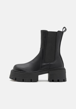 Platform ankle boots - black