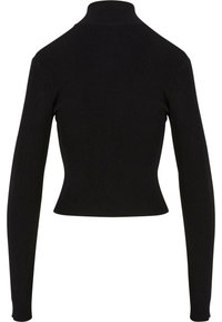 Haut noir à col roulé côtelé avec des manches longues, au design ajusté et à tissu texturé. La vue arrière met en valeur la silhouette élancée et le col haut.
