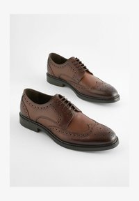 Ausgewählt, brown