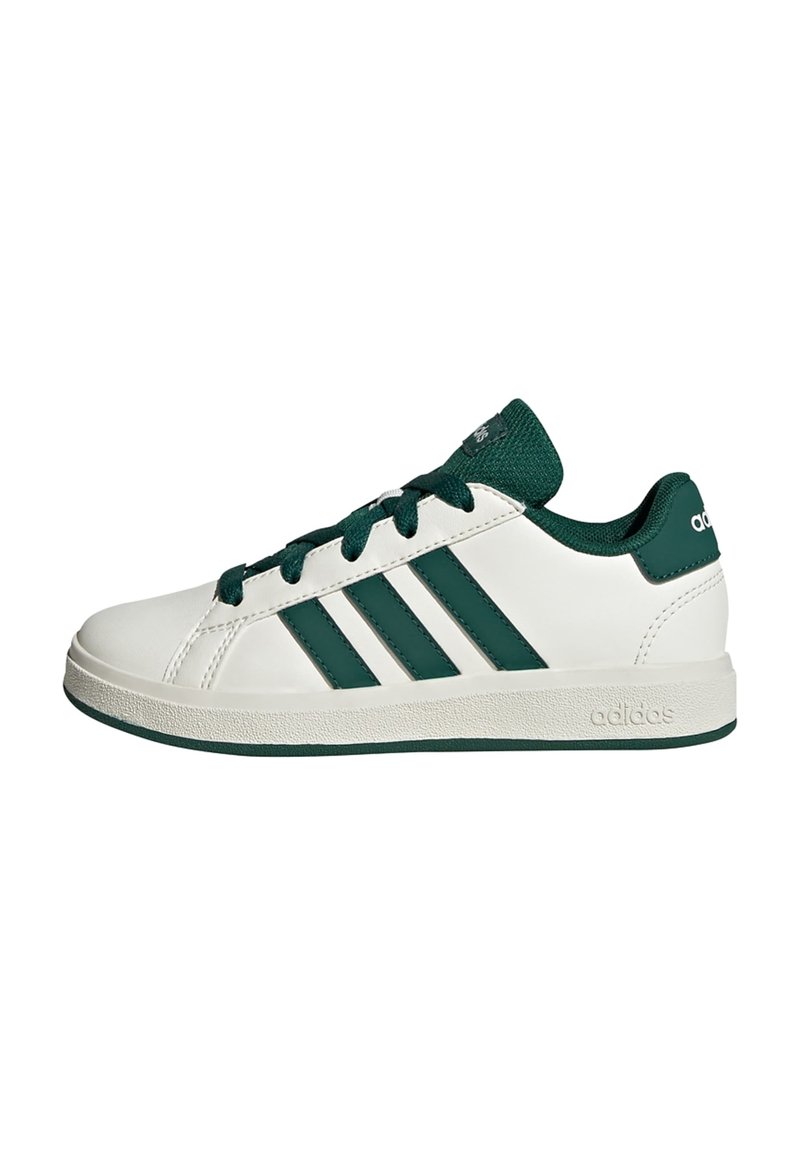 White sneakers with green accents, featuring three green stripes, textured laces, and a rubber sole. Made of synthetic material.