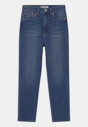 Tummansiniset suoralahkeiset farkut, joissa kuparinväriset metalliosat, viisi taskua ja hienovarainen haalistuma.