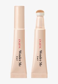 Tubo cosmético de doble extremo en rosa pálido con un aplicador de esponja redondeado. Presenta la inscripción "PUPA Wonder Me 3 EN 1" en el lateral. Textura suave.
