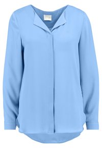 Světle modrá halenka s dlouhým rukávem vyrobená z hladké látky. Obsahuje výstřih do V, jemnou přední légu a zakřivený spodní lem.