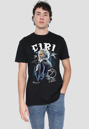 Black cotton t-shirt featuring a graphic print of a character with white hair, blue accents, and stylized text "Ciri" and "Witcher."