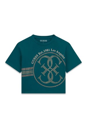 Kort ærmet cropped t-shirt i teal med rund hals, rhinsten udsmykket Guess logo og tekst "GUESS Est. 1981 Los Angeles" foran.