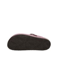 Pink suede shoe with a textured black rubber sole featuring a patterned grip. Buckle detail on the side adds visual interest.