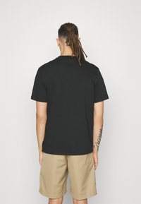 Carhartt WIP MYSTERY MACHINE - Camiseta estampada - black
