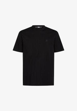 Must reestatud pehme puuvillane must T-särk, millel on ümar kaelus, lühikesed varrukad ja rindkere areas diskreetne samas tooni logo.