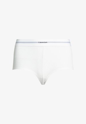 Hvid ribbet bomuldsboks med en gråaccentueret elastisk talje, der bærer Calvin Klein-logoet i sort. Enkel og tætsiddende design.