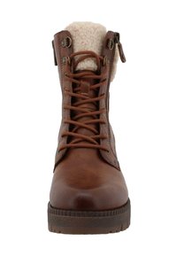 Stivale in pelle marrone con superficie texture, design con lacci, colletto foderato in pelliccia e zip laterale per una facile vestibilità. Suola in gomma con motivo antiscivolo.