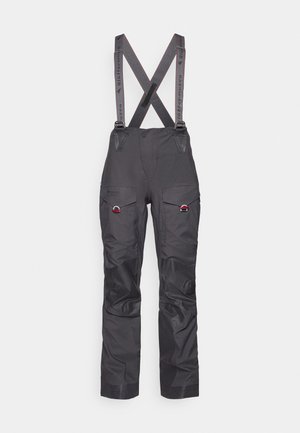 Pantaloni da sci neri impermeabili con bretelle regolabili, ginocchia rinforzate, multiple tasche e cinghie grigie in contrasto. Tessuto resistente.
