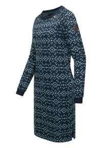 Navy blue dress featuring geometric patterns in light blue, long sleeves, round neckline, button accents on shoulder, with side slits.