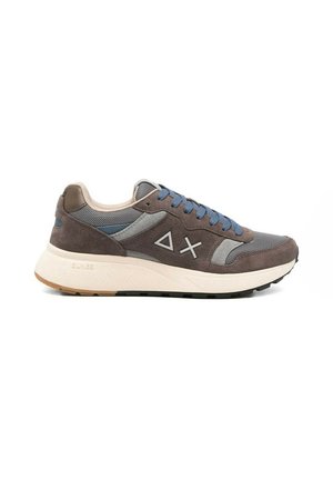 Gray and brown athletic sneaker with blue laces, light beige sole, and white geometric logo on the side, shown from the outer side.