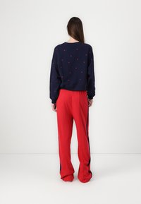 GAP TRACK PANT - Jogginghose - modern red