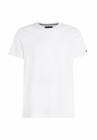 T-shirt bianco in cotone con scollo rotondo, maniche corte e un piccolo dettaglio del logo sulla manica sinistra. Tessuto liscio, vestibilità classica.