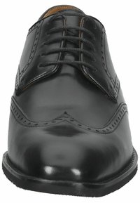 Scarpa da uomo in pelle nera con punta rotonda, decorazioni brogue e sei fori per i lacci. Finitura liscia e suola in gomma robusta.
