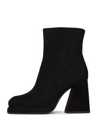 Black suede ankle boot with a rounded toe and a wide, angular heel. Smooth texture and minimalist design, no visible hardware or embellishments.