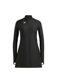 Pull-over noir à manches longues avec un col zippé mi-long, fabriqué en tissu lisse ; comprend le logo Adidas blanc sur la poitrine gauche.