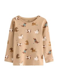 Beige langærmet skjorte med hundemotiv i brun og hvid. Stof er blødt med en glat overflade og rund halsudskæring.
