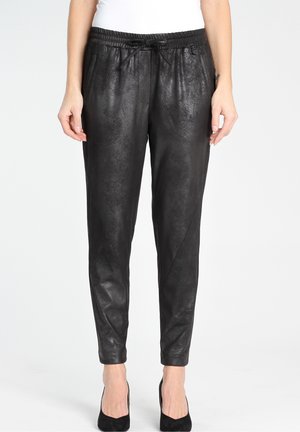 Black faux leather jogger pants with an elastic waistband, drawstring, and tapered leg design. Smooth texture with subtle sheen.